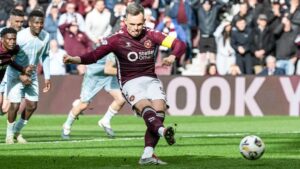 Hearts seal late win against Motherwell to maintain lead at top