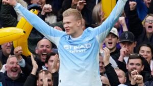 Man City continue to weather storm as Haaland scores twice in Ipswich win
